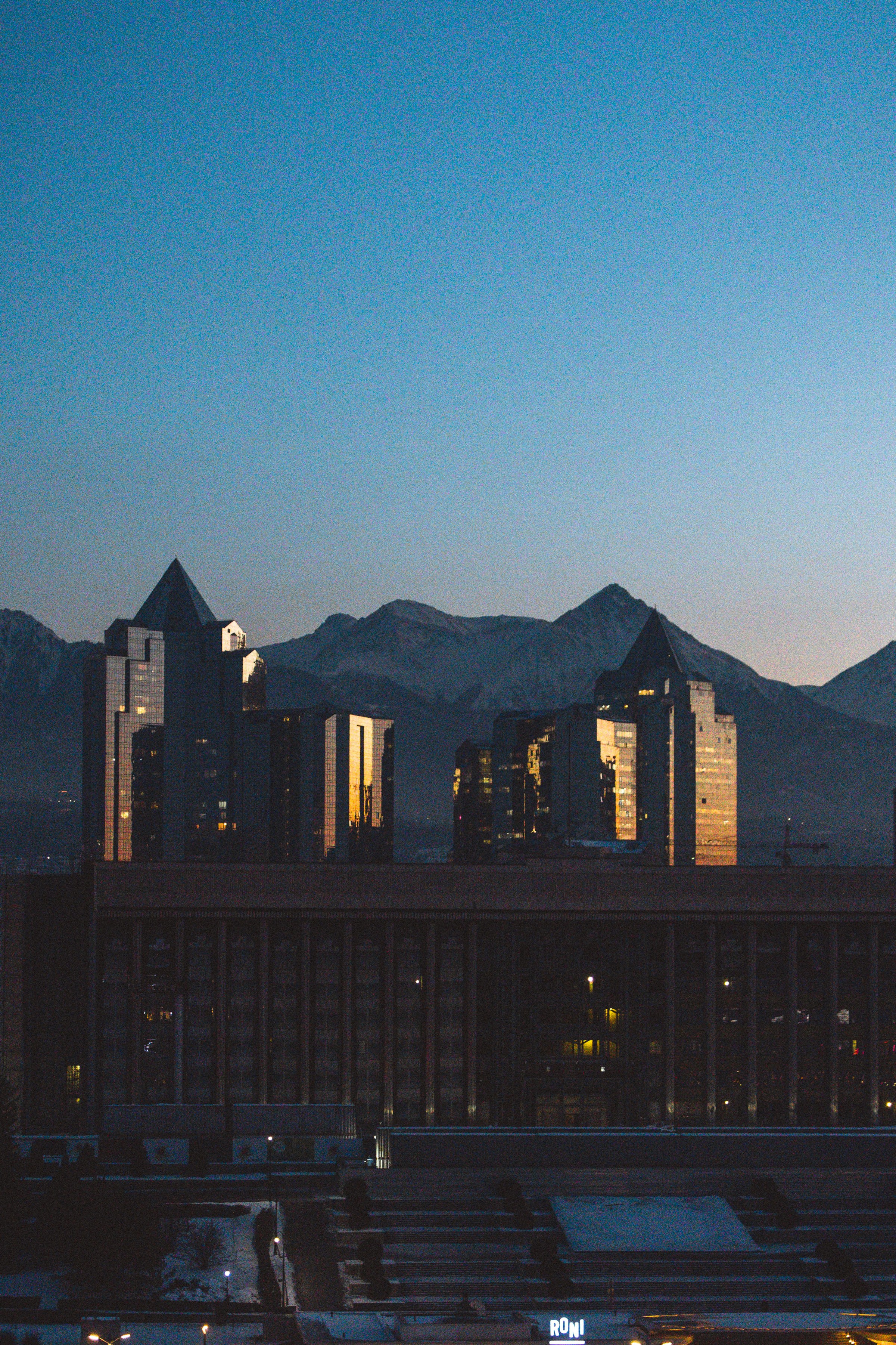 Almaty city skyline framed by the Trans-Ili Alatau mountains