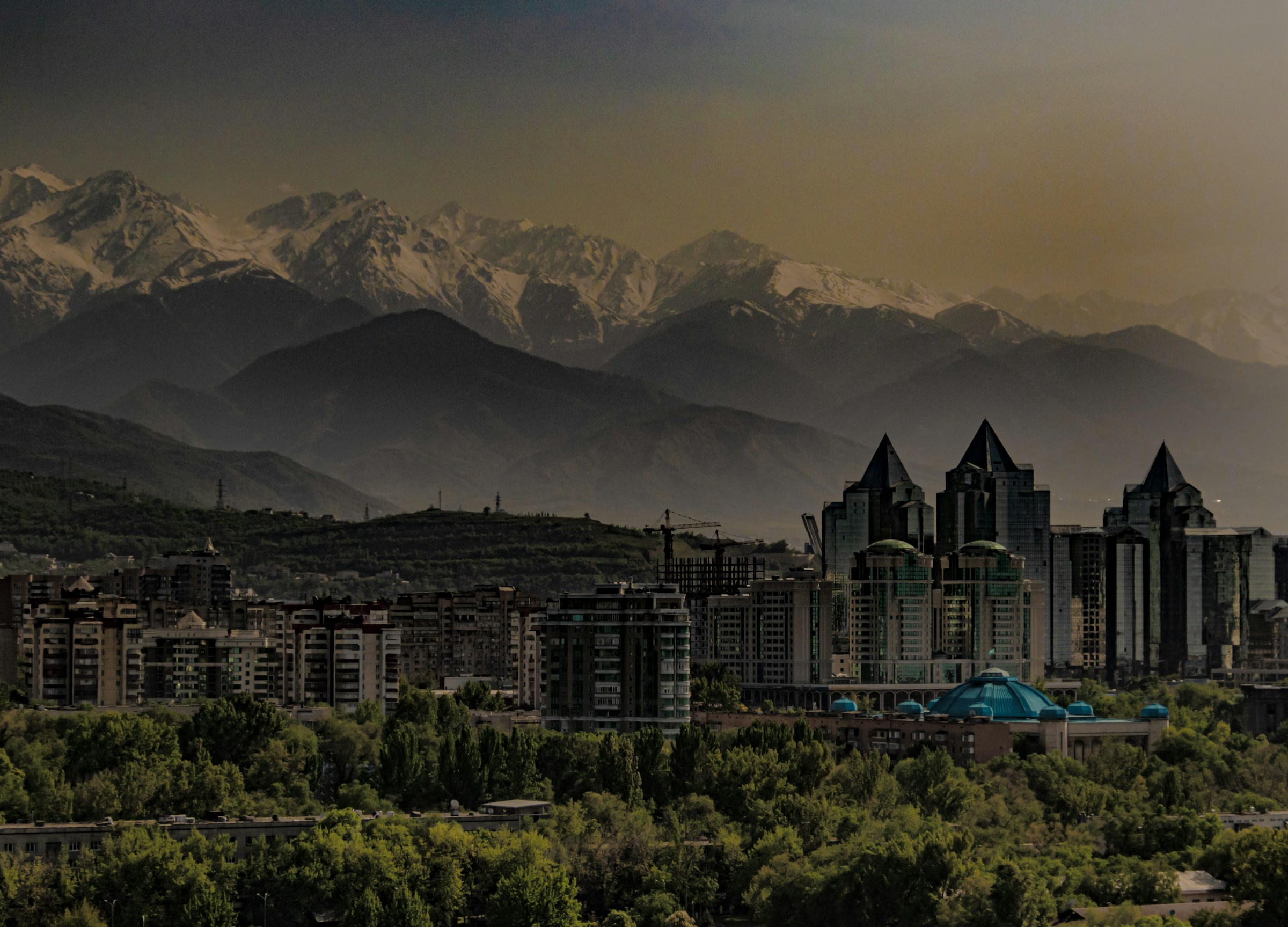 Almaty city with the Central Asian mountain range beyond
